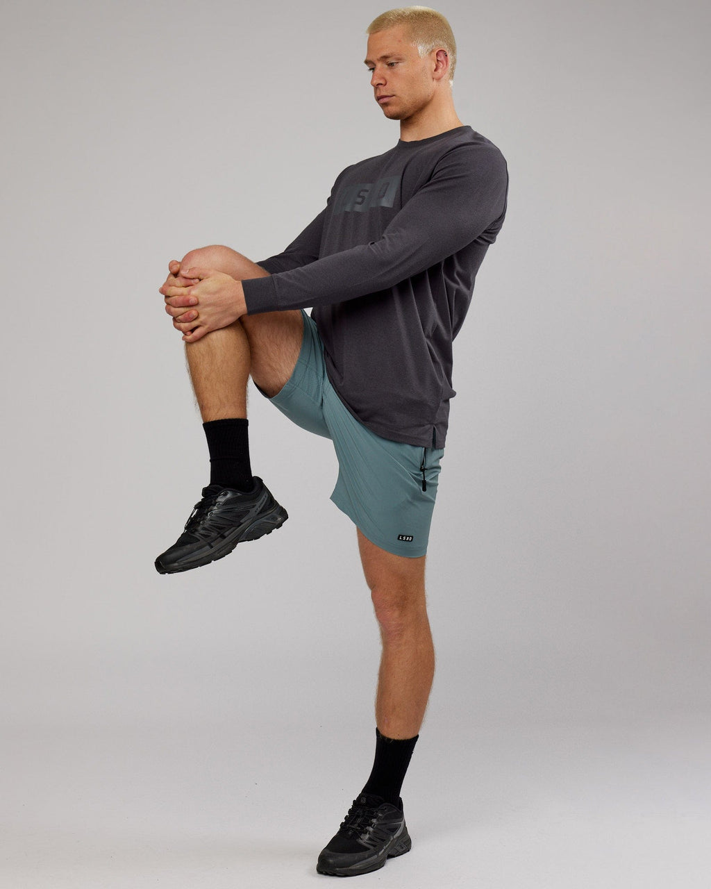 Model wearing Strength FLXDRY Performance LS Tee - Asphalt