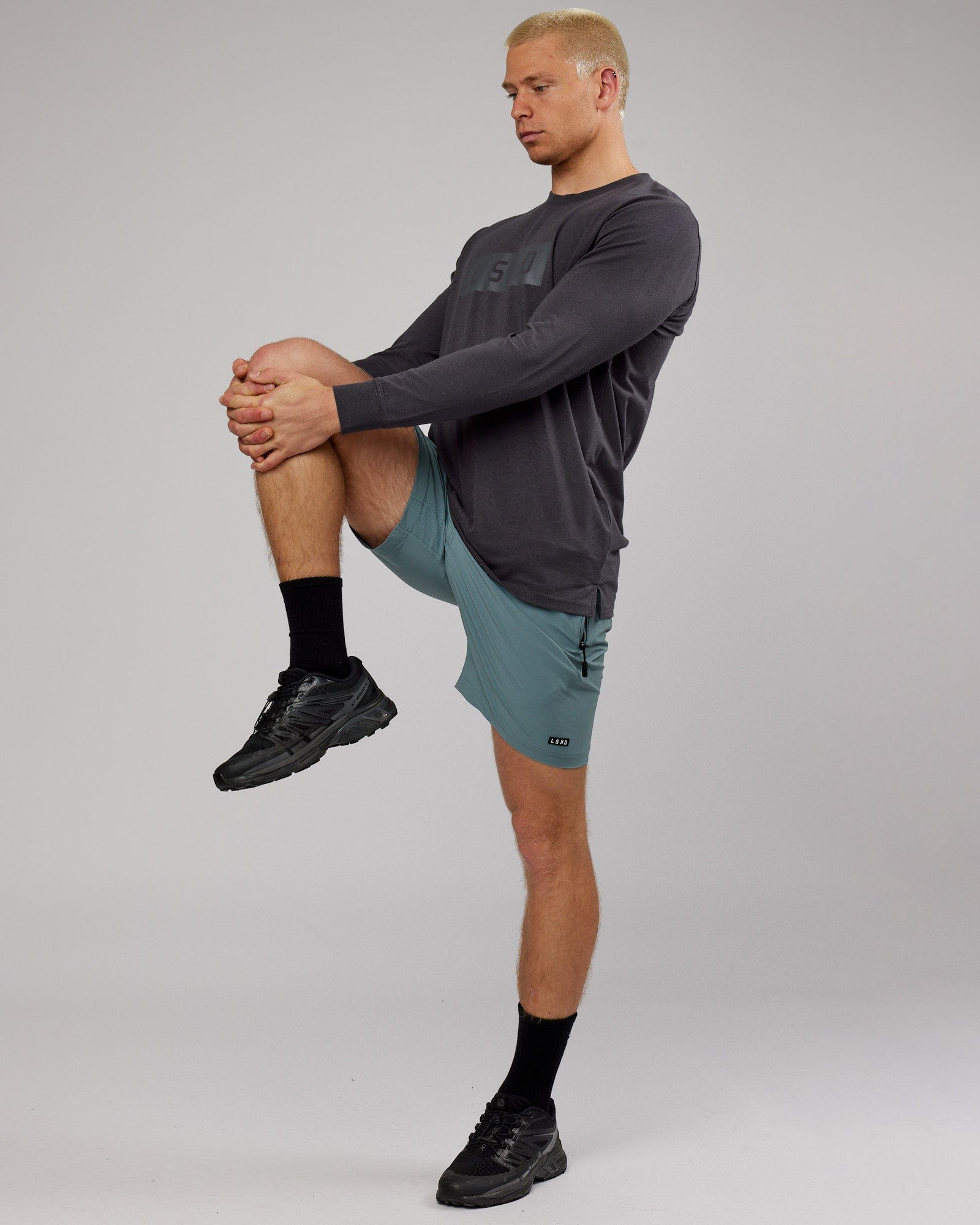 Model wearing Strength FLXDRY Performance LS Tee - Asphalt