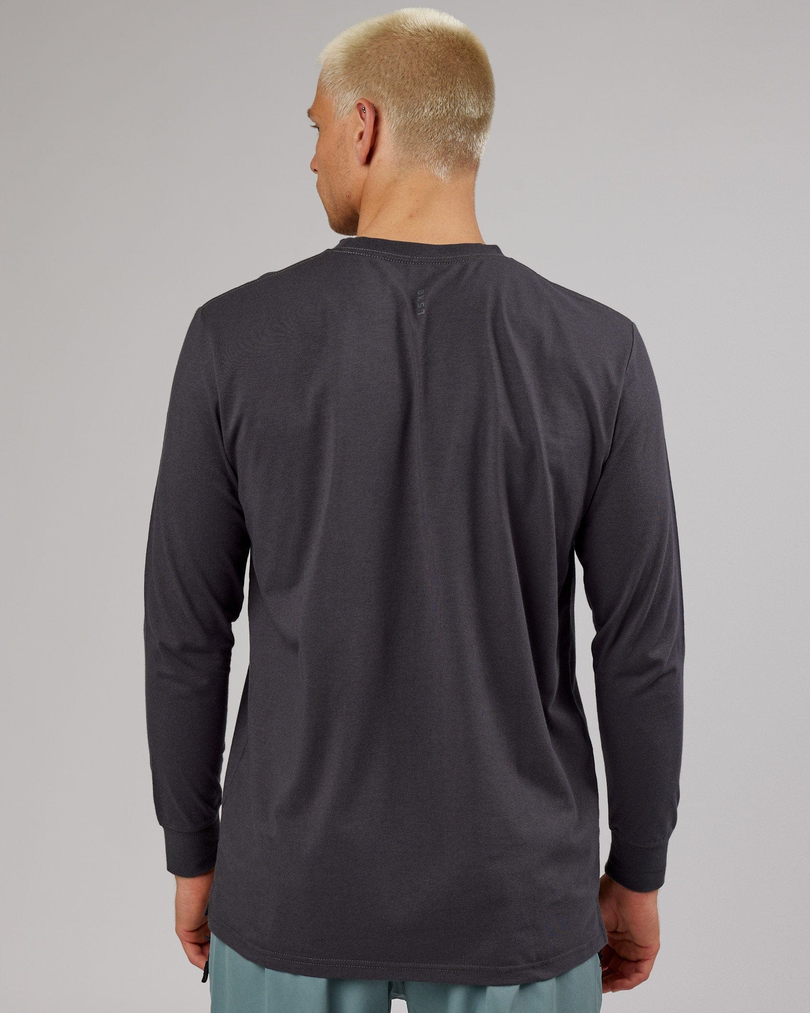 Model wearing Strength FLXDRY Performance LS Tee - Asphalt