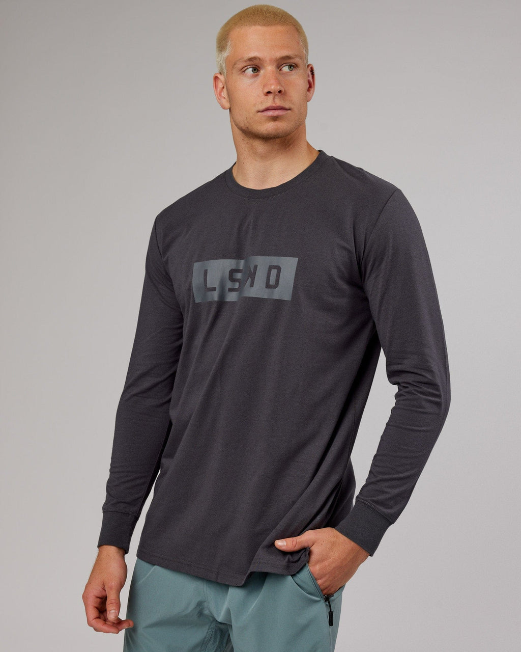 Model wearing Strength FLXDRY Performance LS Tee - Asphalt