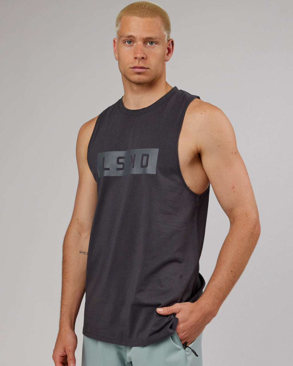 Model wearing Strength FLXDRY Training Fit Performance Tank - Asphalt