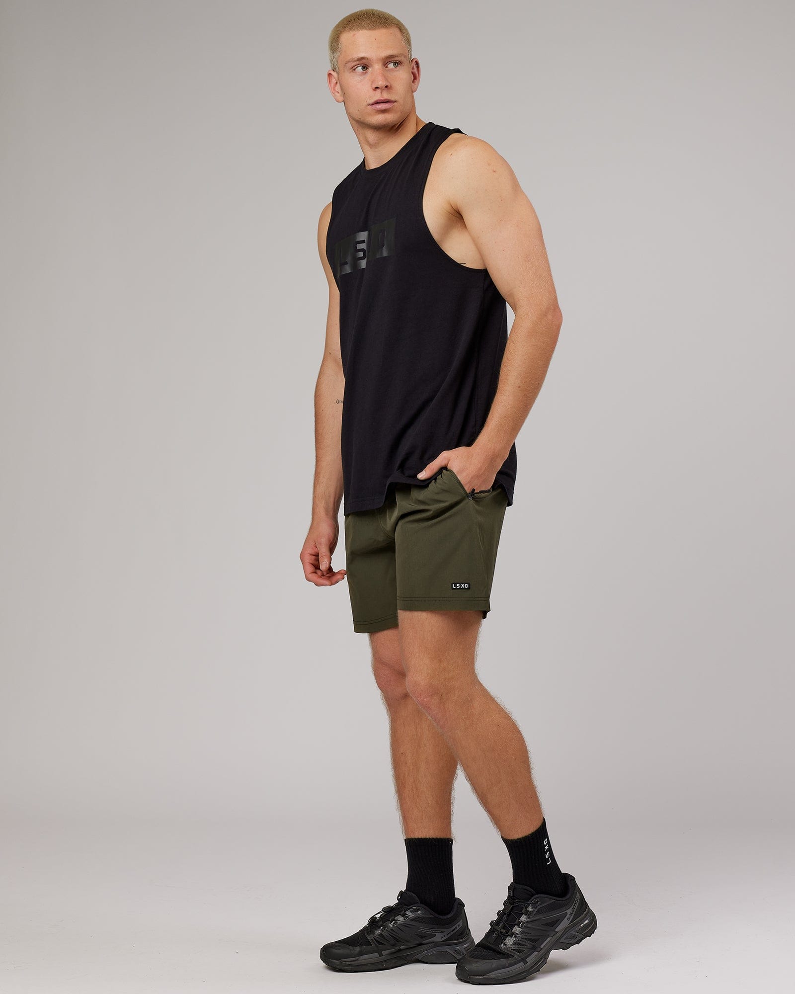 Model wearing Strength FLXDRY Training Fit Performance Tank - Black