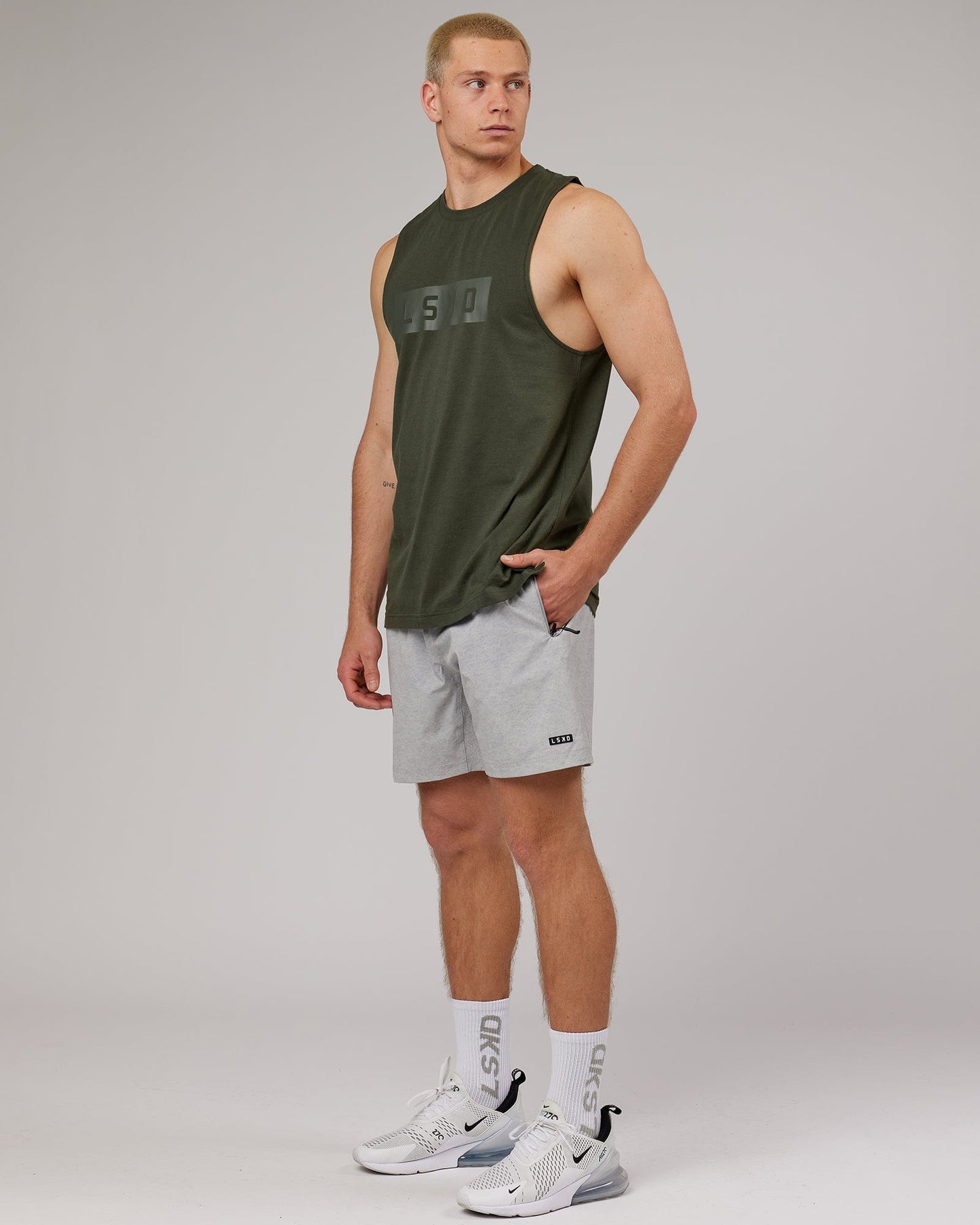 Model wearing Strength FLXDRY Training Fit Performance Tank - Forest Night