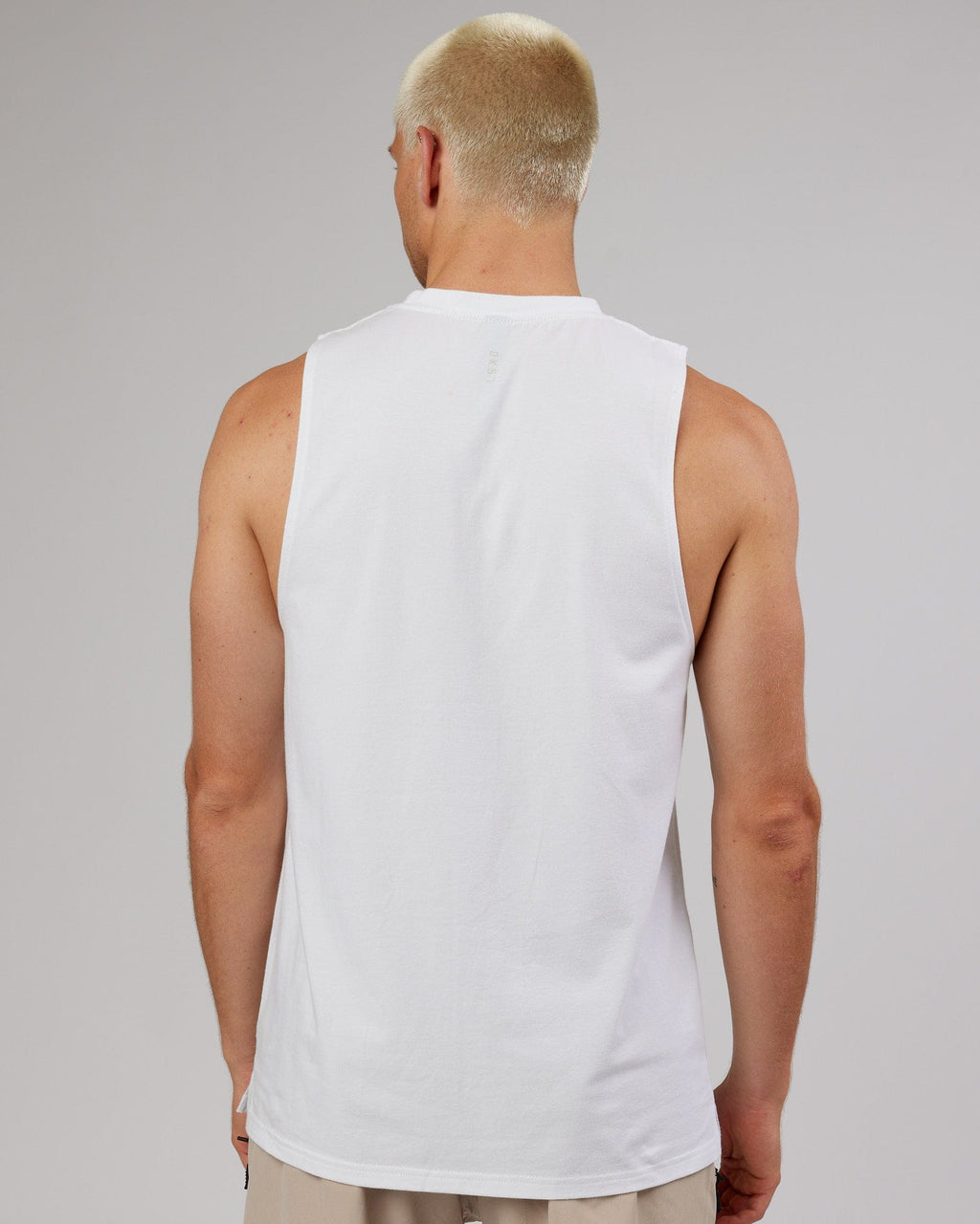 Model wearing Strength FLXDRY Training Fit Performance Tank - White-Taupe