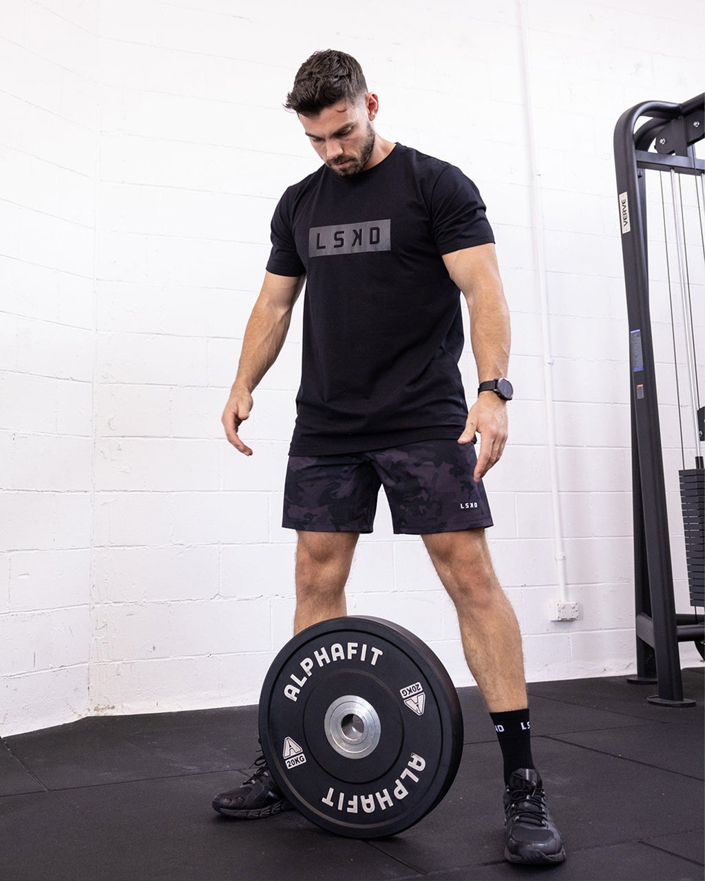 Model wearing Strength FLXDRY Performance Tee - Black-Black