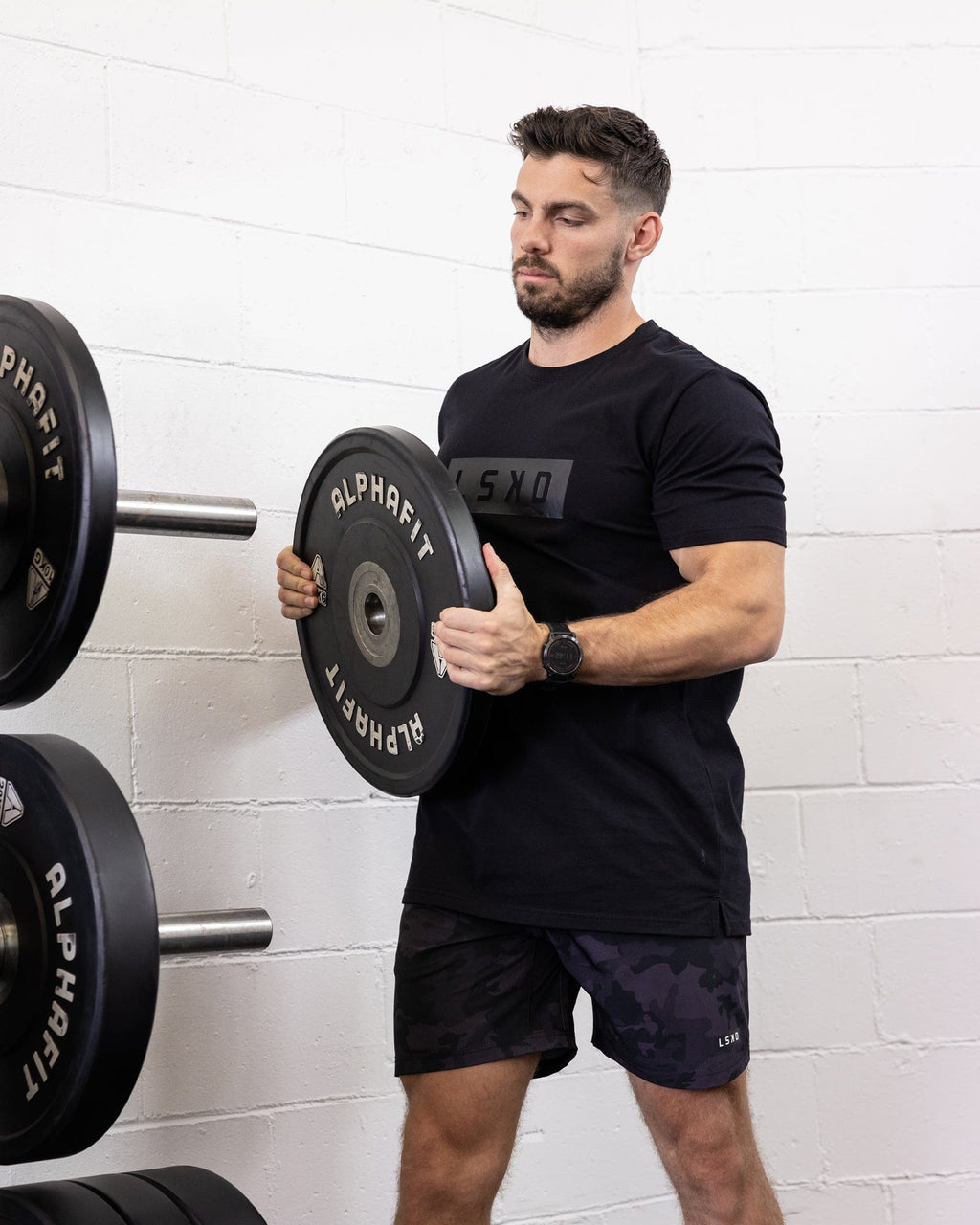 Model wearing Strength FLXDRY Performance Tee - Black-Black