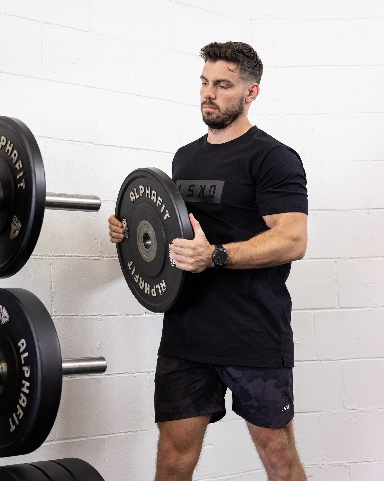 Model wearing Strength FLXDRY Performance Tee - Black-Black