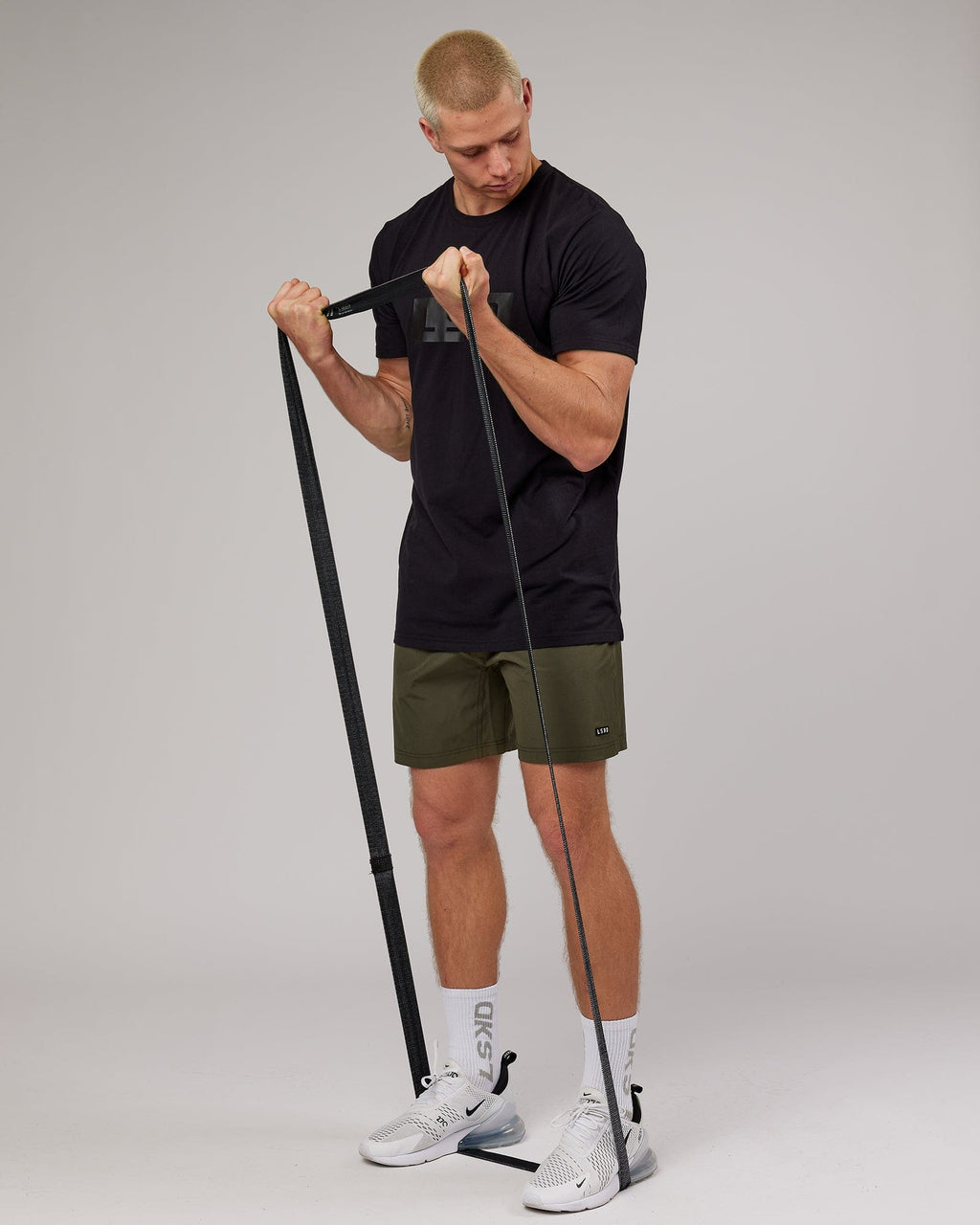 Model wearing Strength FLXDRY Performance Tee - Black-Black