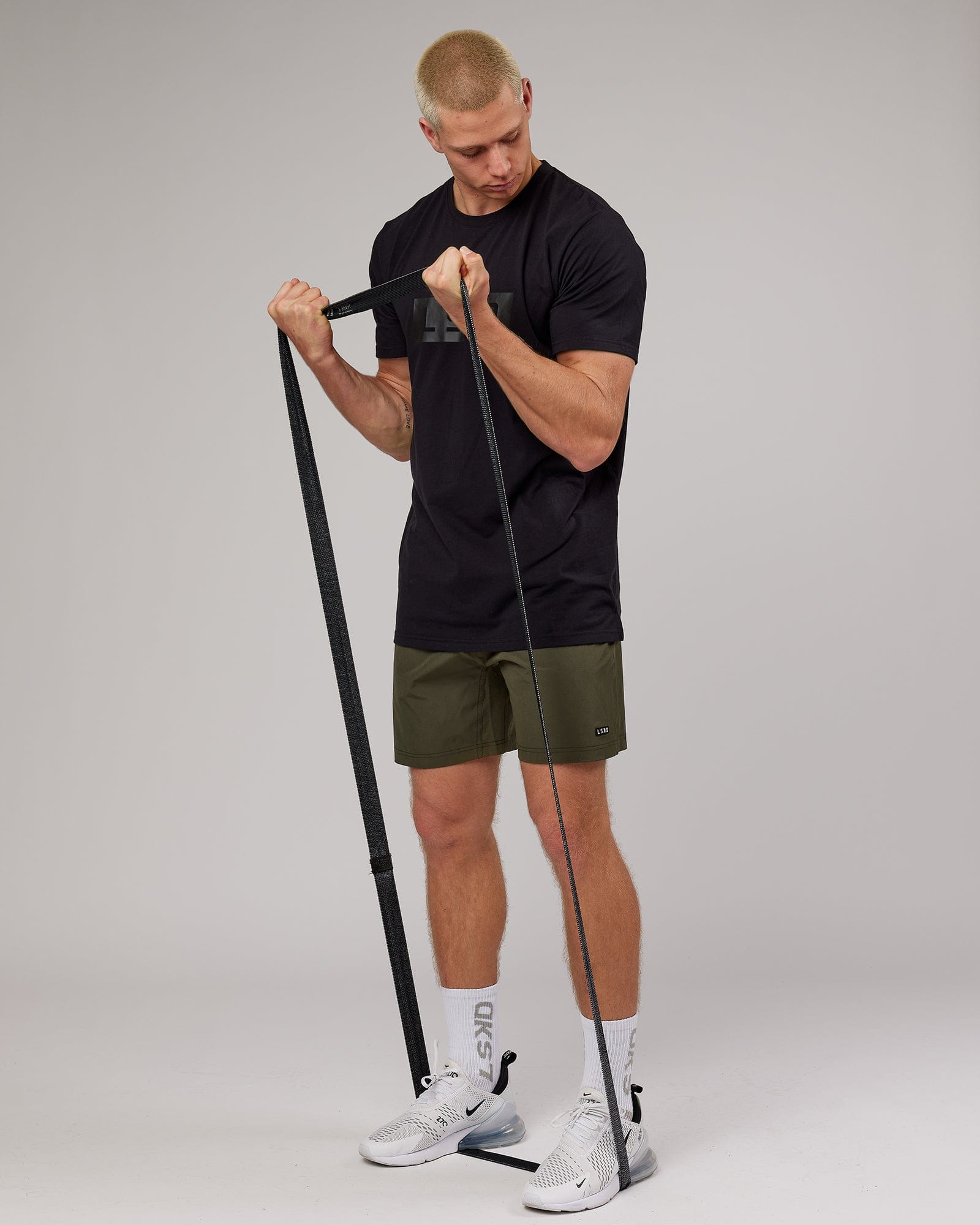 Model wearing Strength FLXDRY Performance Tee - Black-Black