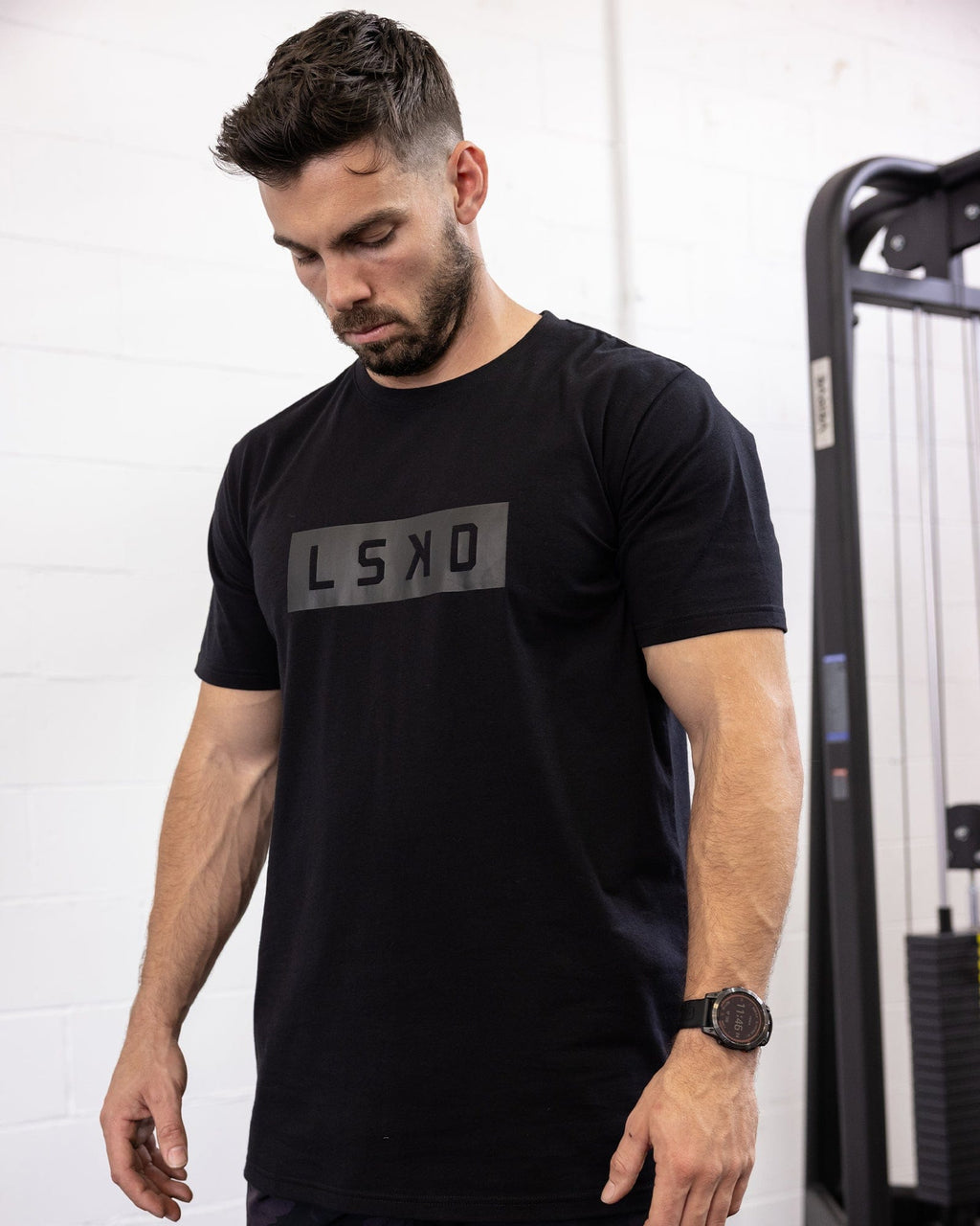 Model wearing Strength FLXDRY Performance Tee - Black-Black