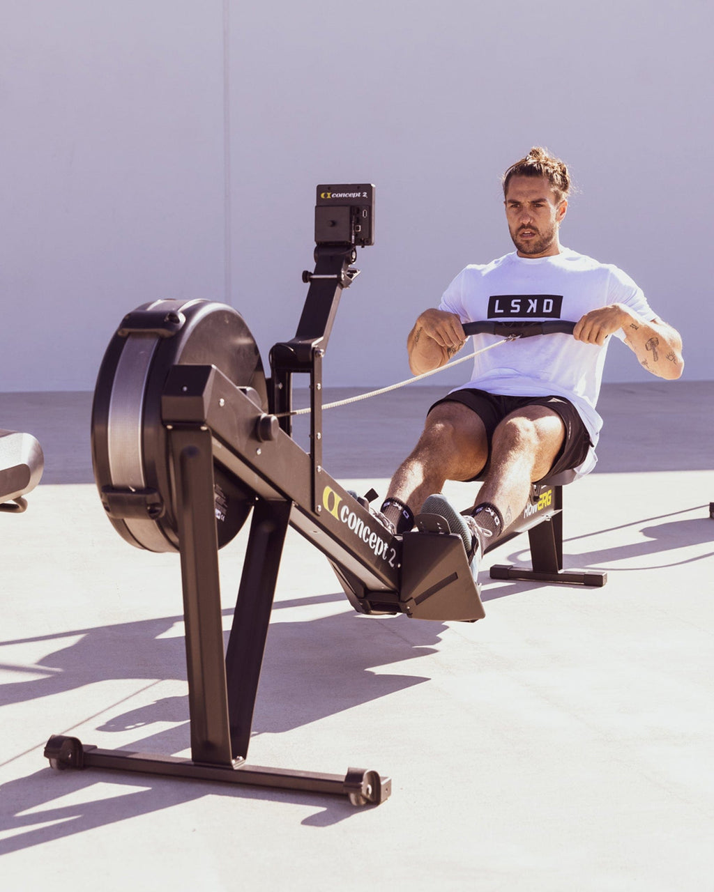 Model wearing Strength FLXDRY Performance Tee - White-Black