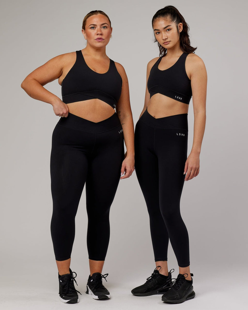 Model wearing Strike 7/8 Length Tight - Black