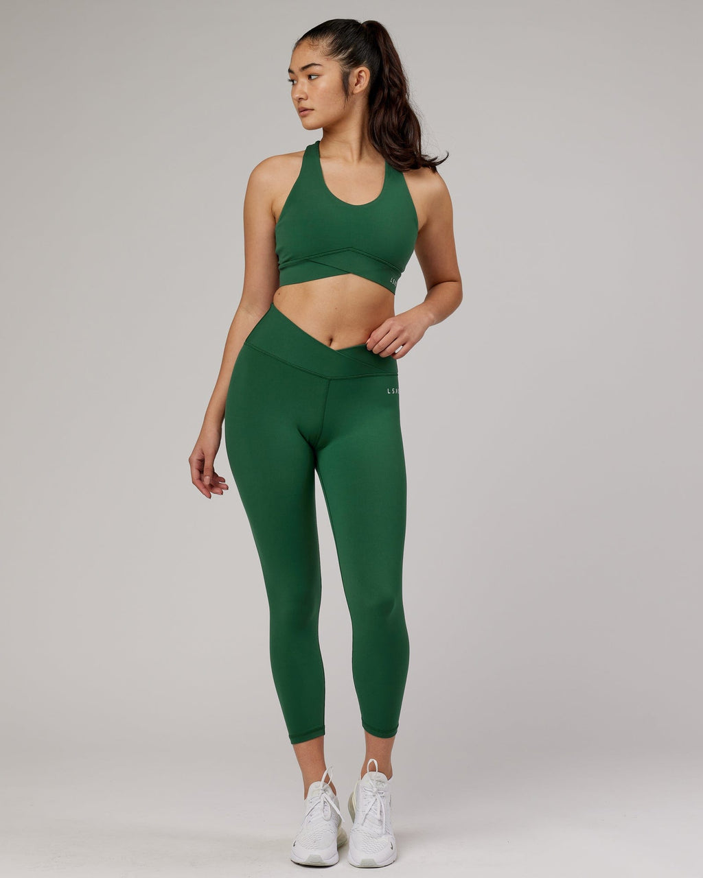 Model wearing Strike 7/8 Length Tight - Pineneedle