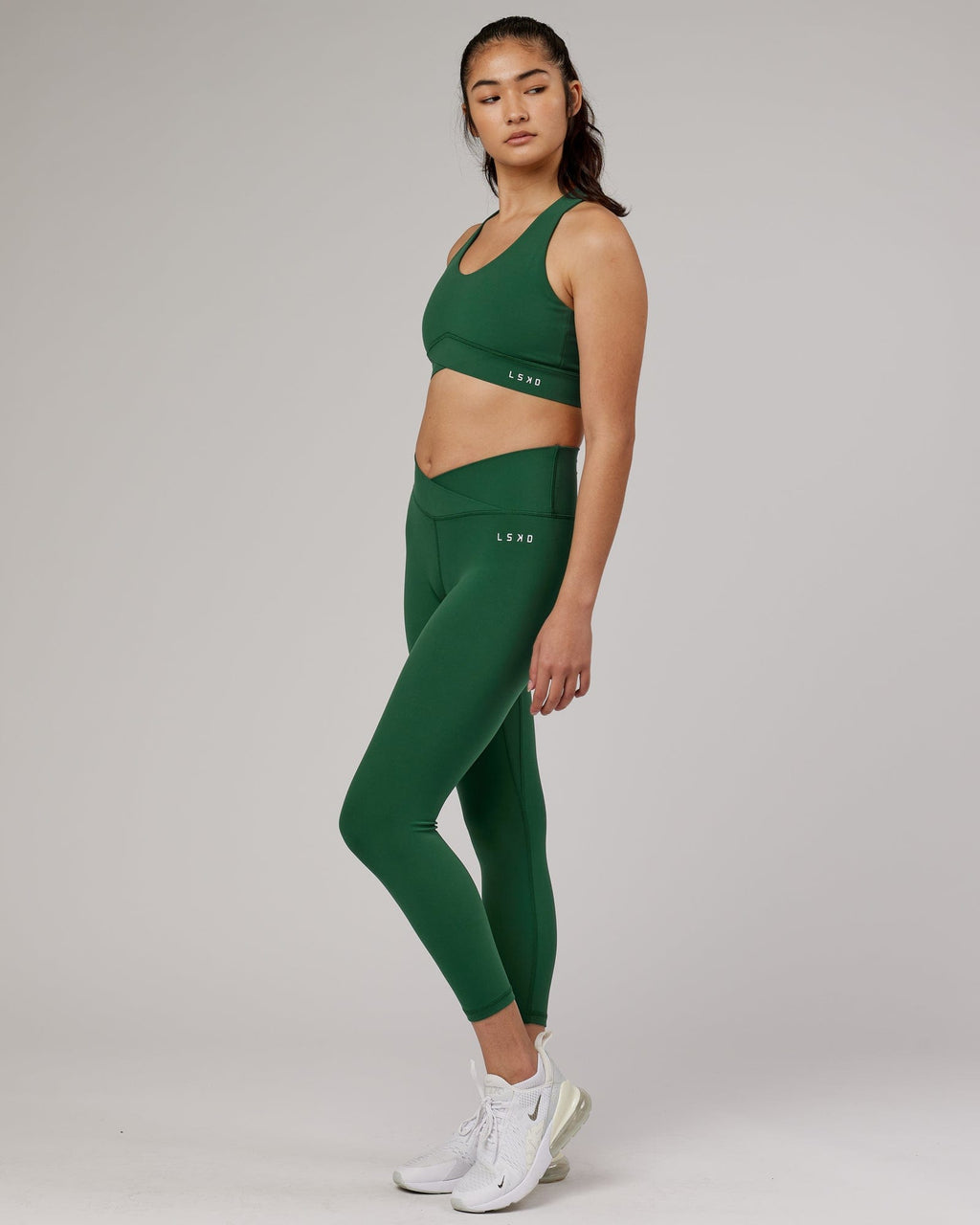 Model wearing Strike 7/8 Length Tight - Pineneedle