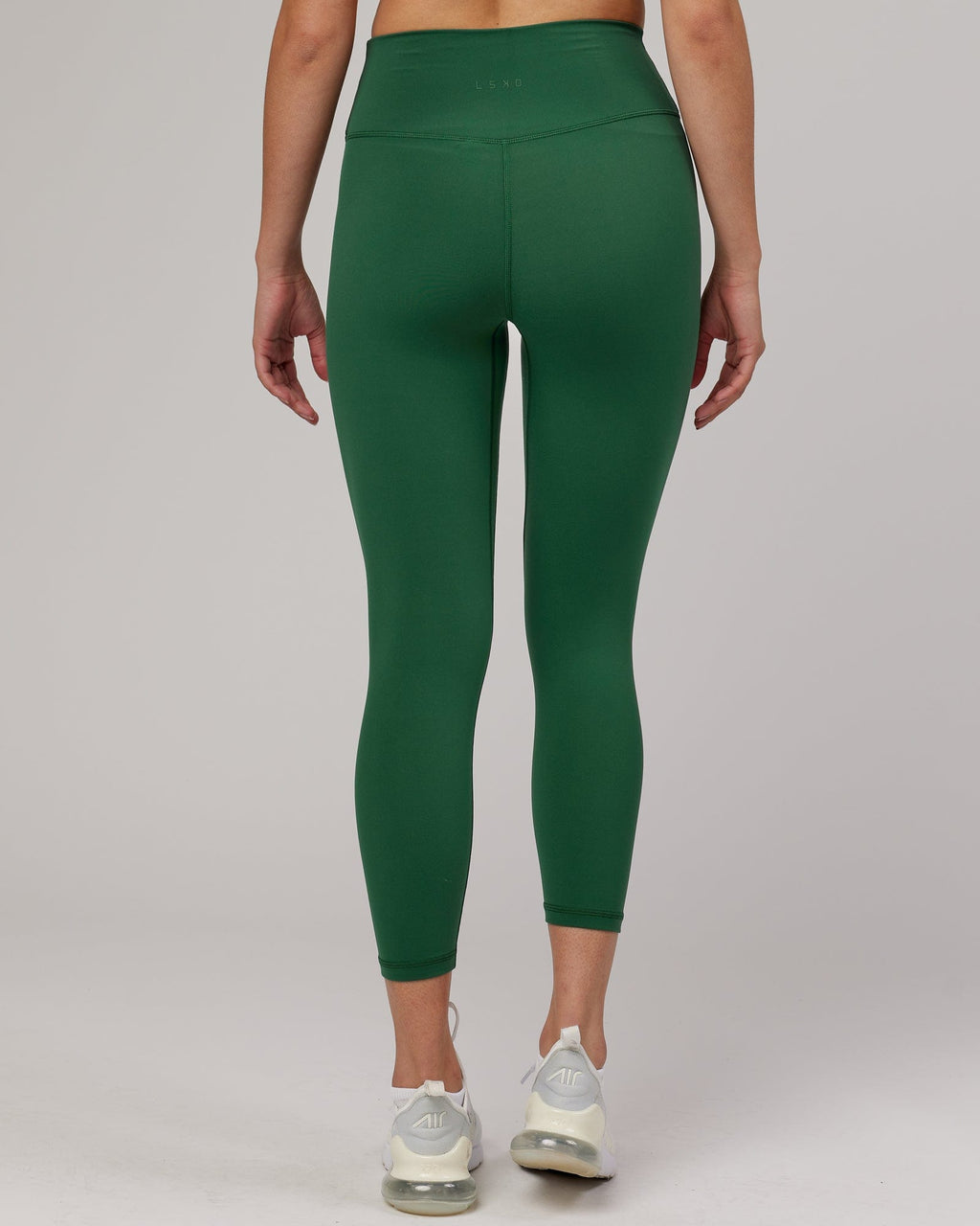 Model wearing Strike 7/8 Length Tight - Pineneedle