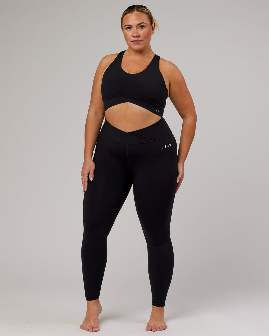 Model wearing Strike Full Length Tight - Black