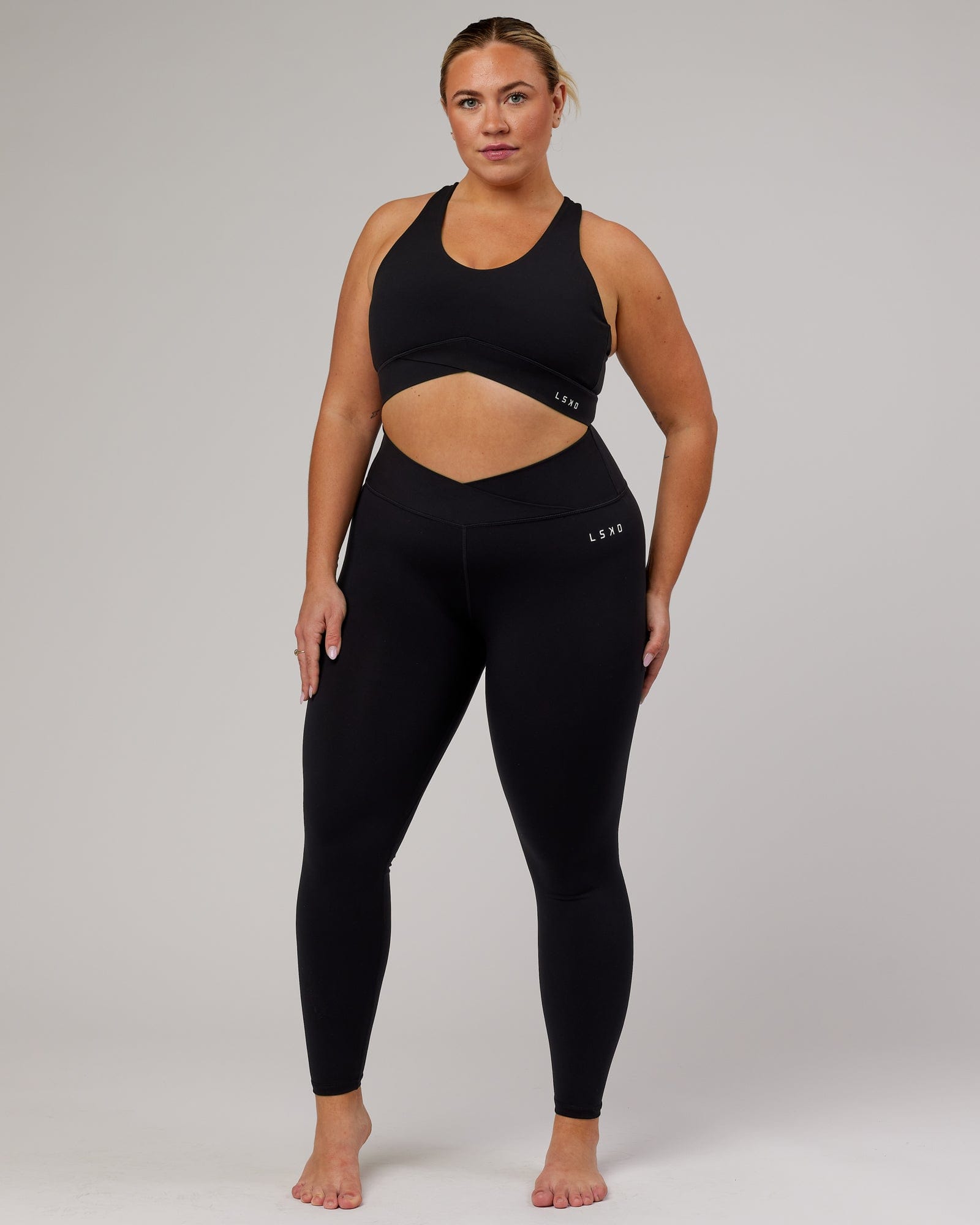 Model wearing Strike Full Length Tight - Black