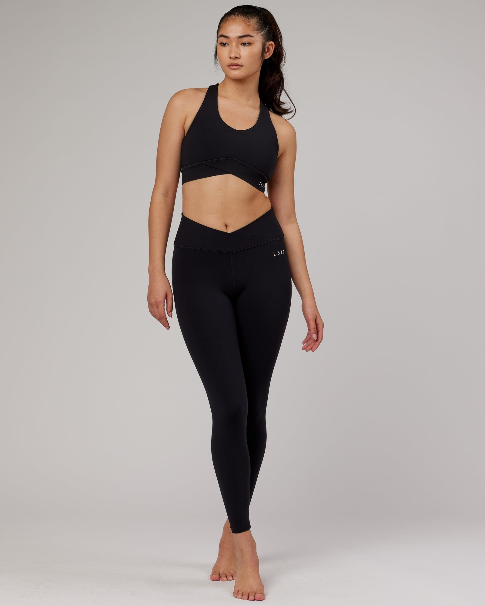 Model wearing Strike Full Length Tight - Black