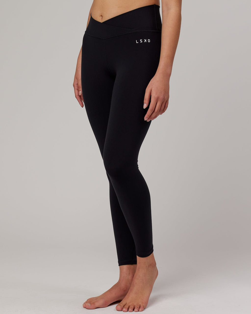 Model wearing Strike Full Length Tight - Black