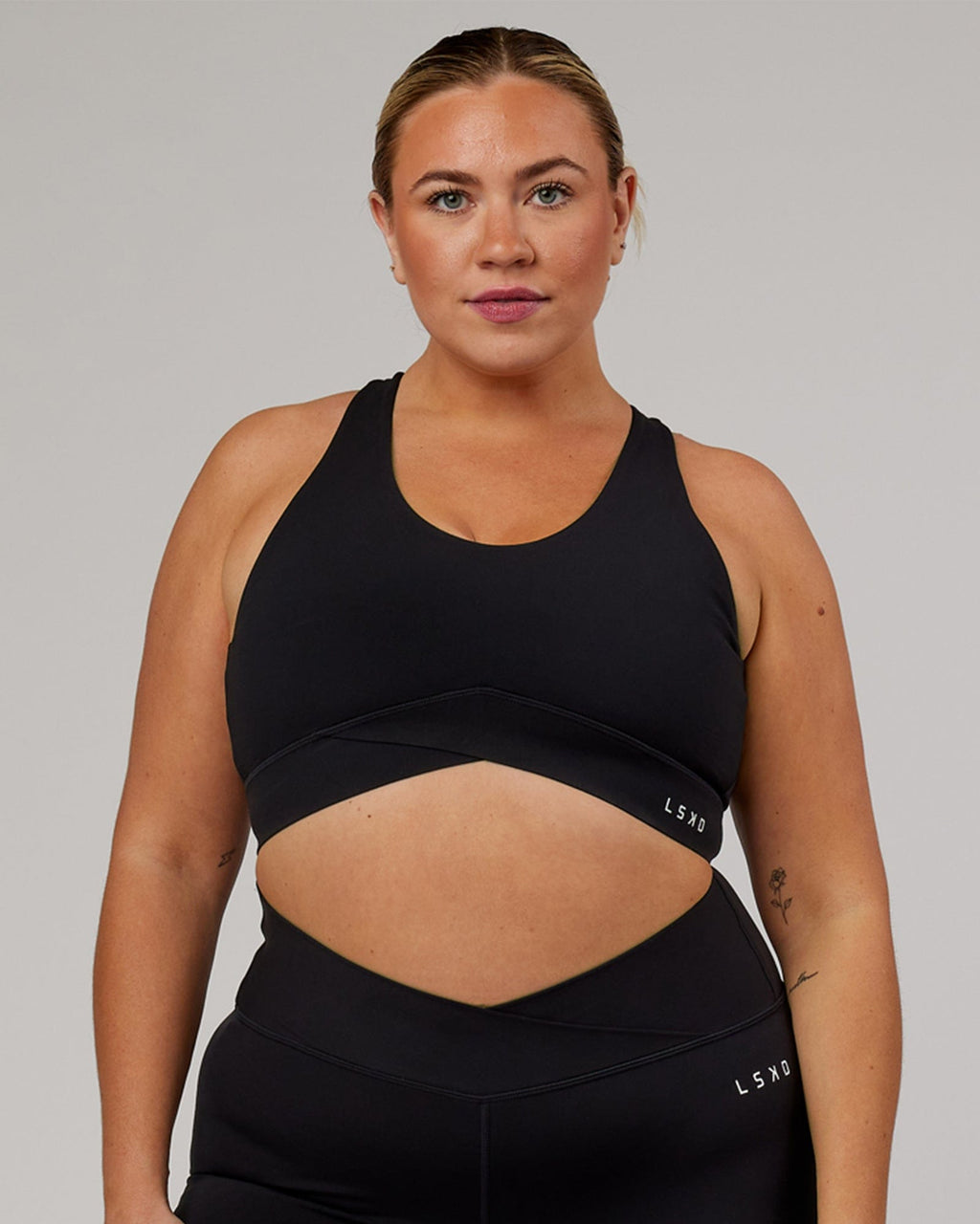 Model wearing Strike Sports Bra - Black