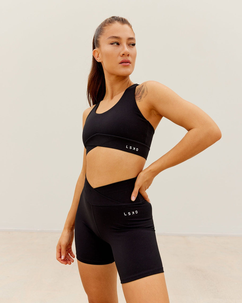 Model wearing Strike Sports Bra - Black
