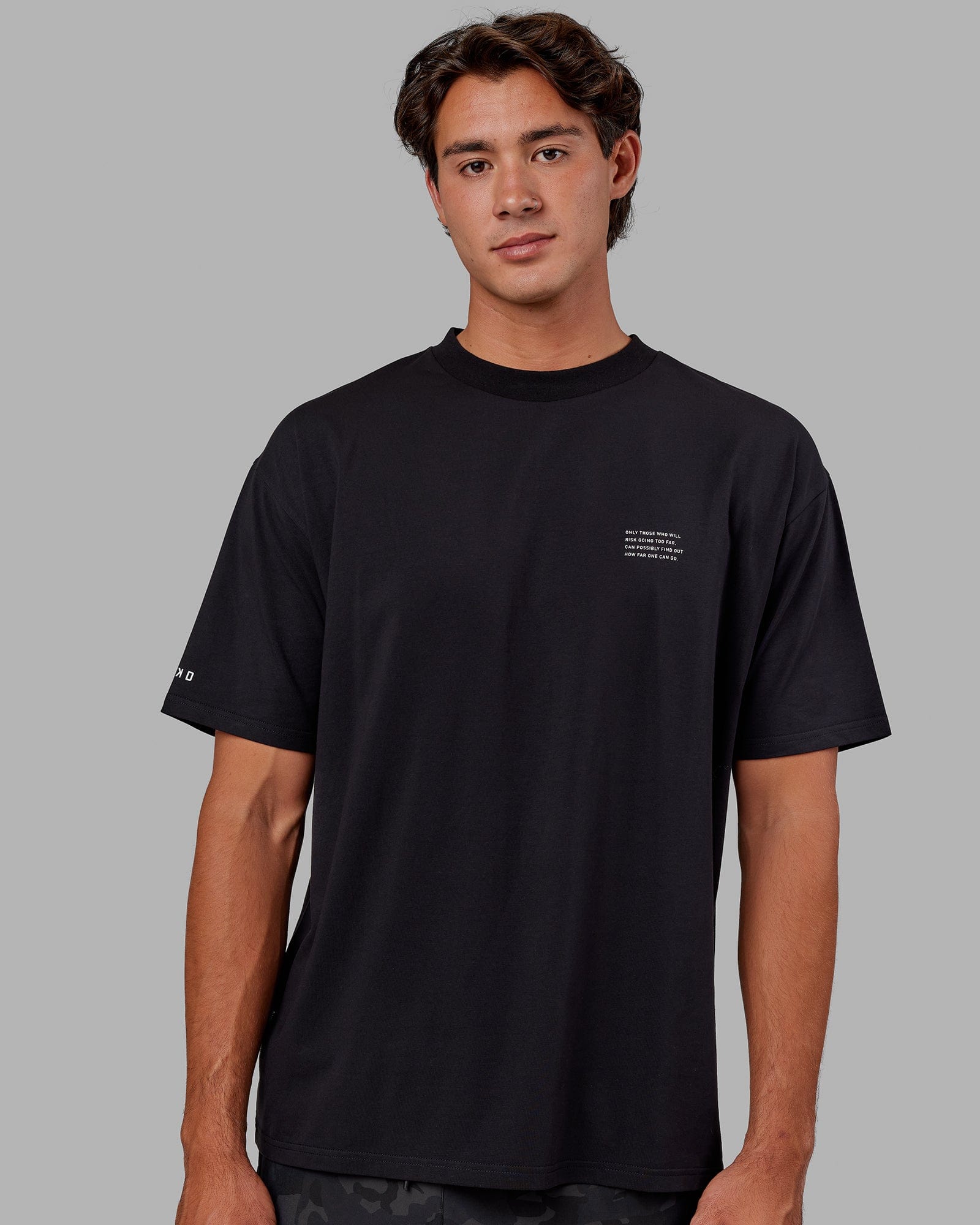 Model wearing Strive FLXCotton Tee Oversize - Black-White