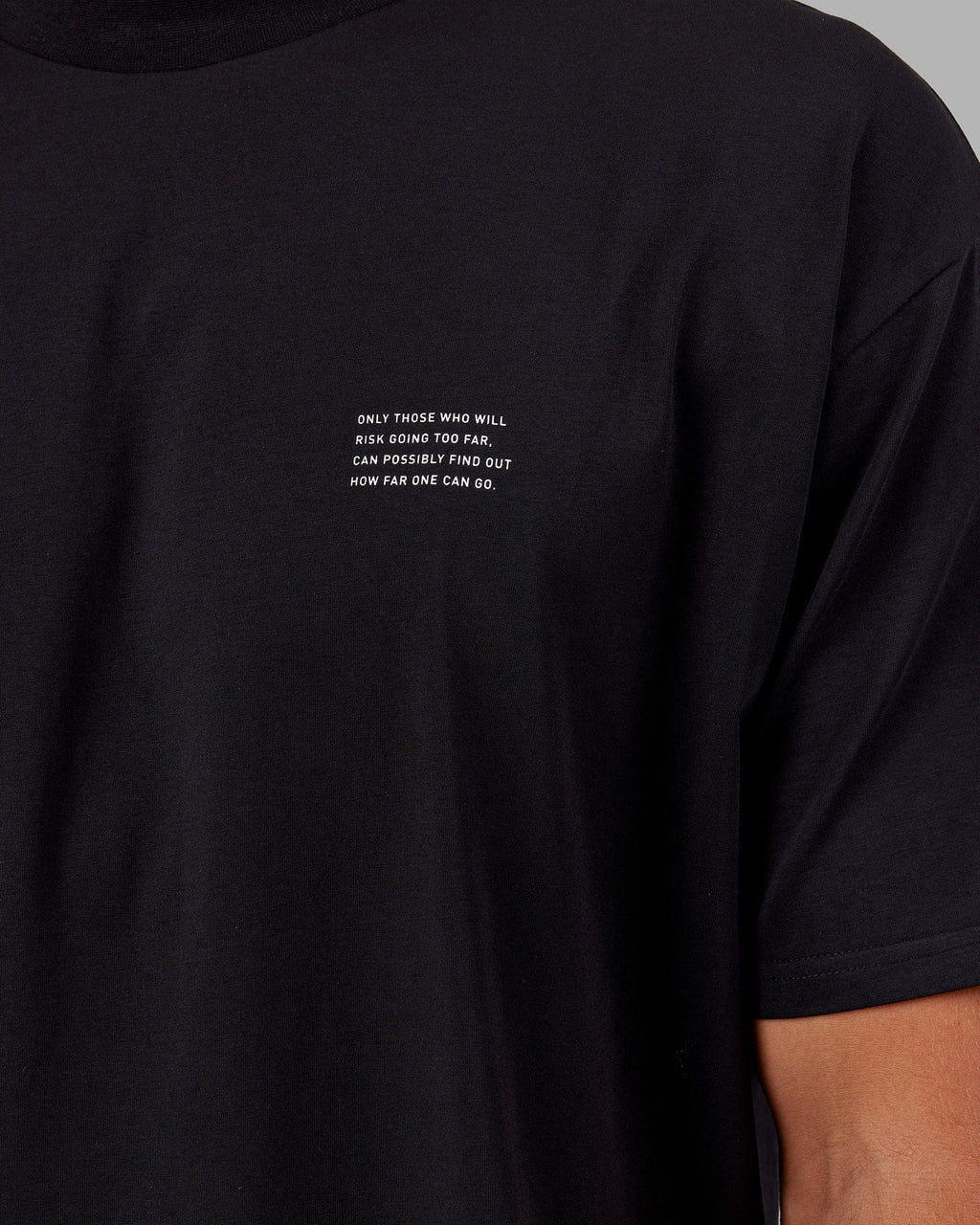 Model wearing Strive FLXCotton Tee Oversize - Black-White