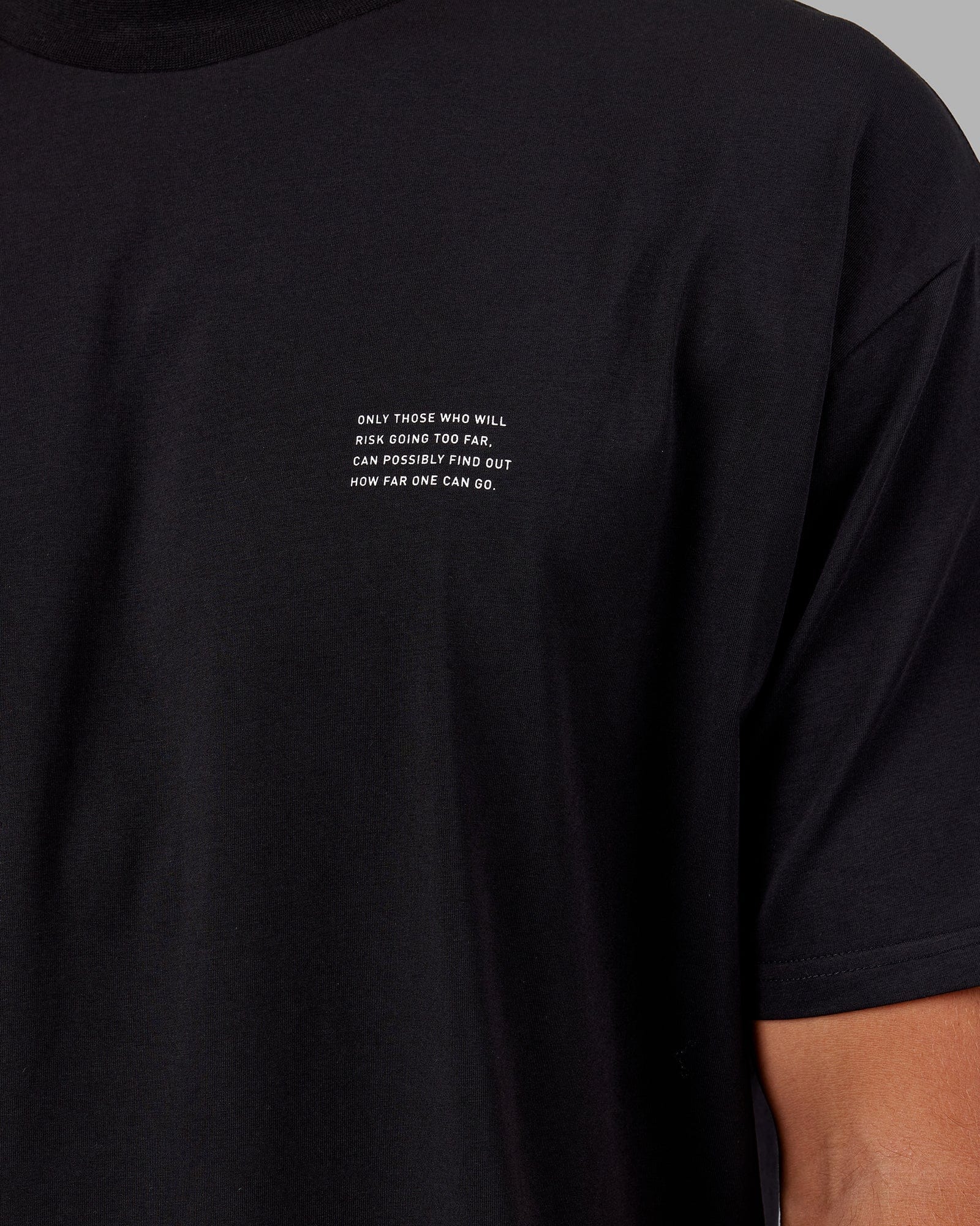 Model wearing Strive FLXCotton Tee Oversize - Black-White