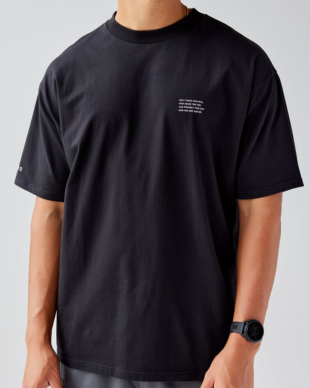 Model wearing Strive FLXCotton Tee Oversize - Black-White