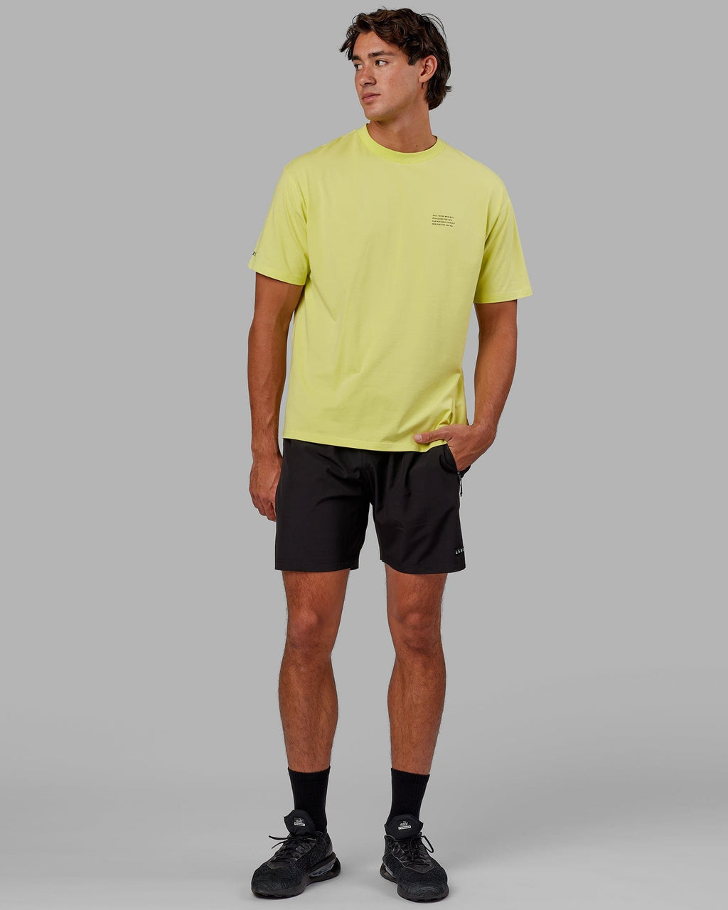 Model wearing Strive FLXCotton Tee Oversize - Citrus Green