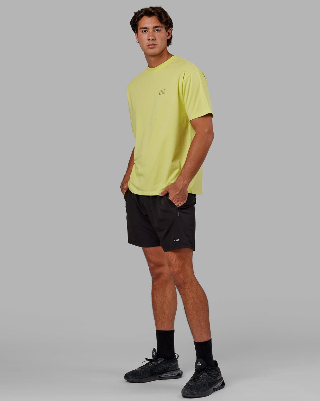 Model wearing Strive FLXCotton Tee Oversize - Citrus Green