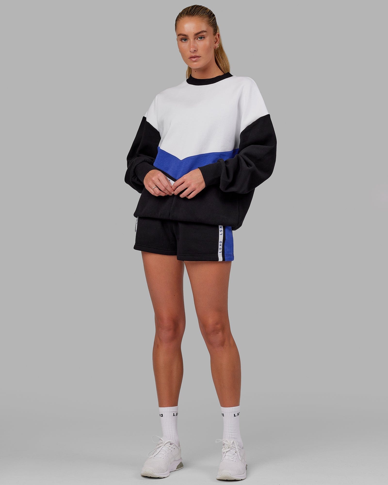 Model wearing Time Out Sweater Oversize - Black-Power Cobalt
