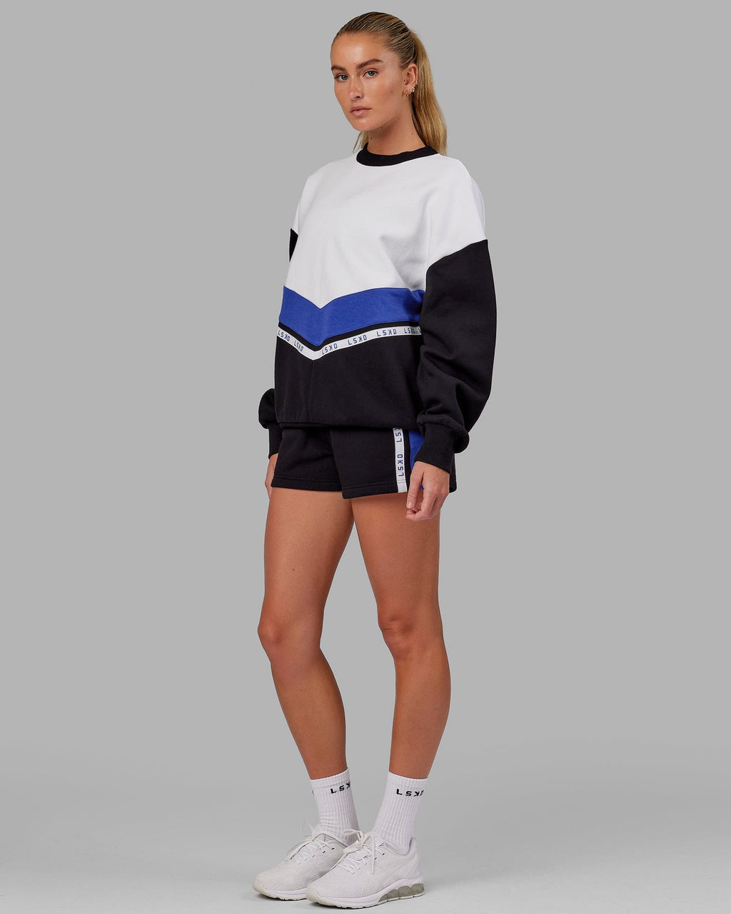 Model wearing Time Out Sweater Oversize - Black-Power Cobalt