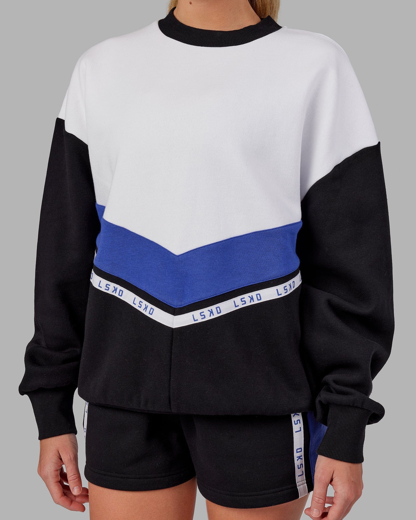 Model wearing Time Out Sweater Oversize - Black-Power Cobalt