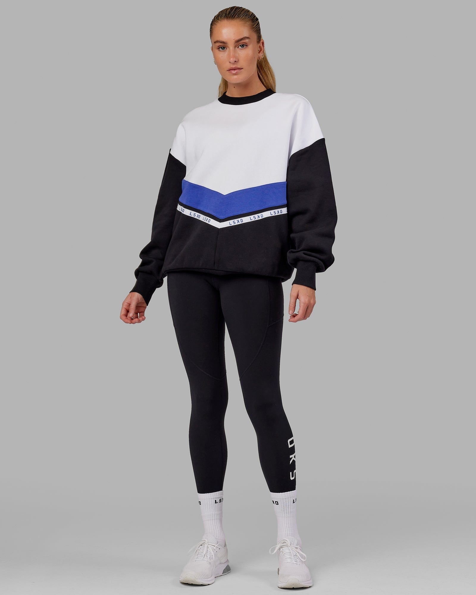 Model wearing Time Out Sweater Oversize - Black-Power Cobalt