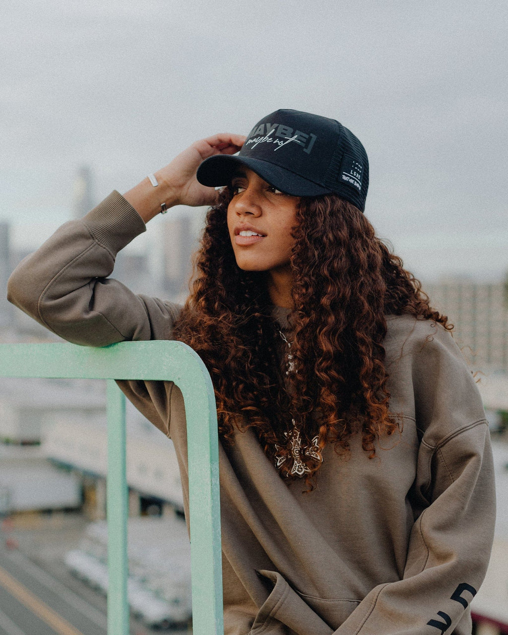 Model wearing TOBK Trucker Hat - Black