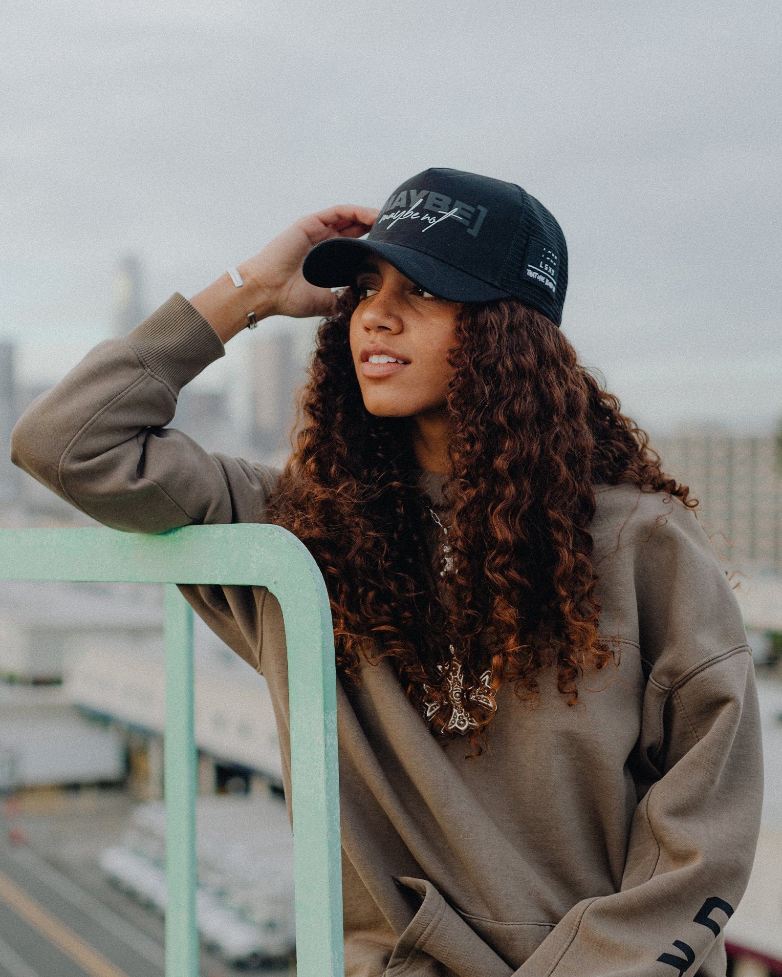 Model wearing TOBK Trucker Hat - Black