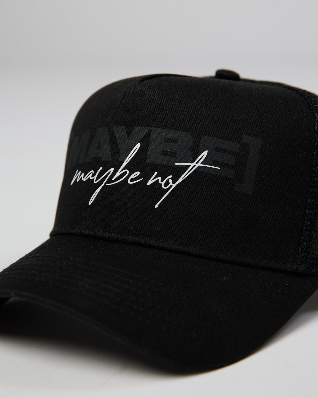 Model wearing TOBK Trucker Hat - Black