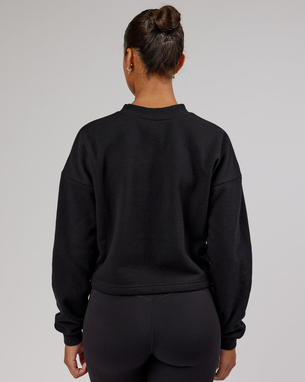Model wearing Touchdown Sweater - Black