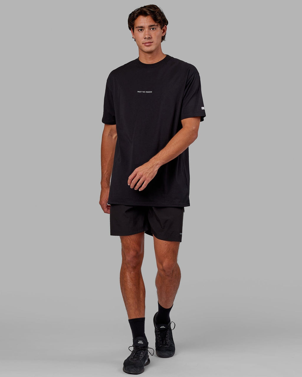 Model wearing Trust The Process FLXCotton Tee Longline Oversize - Black