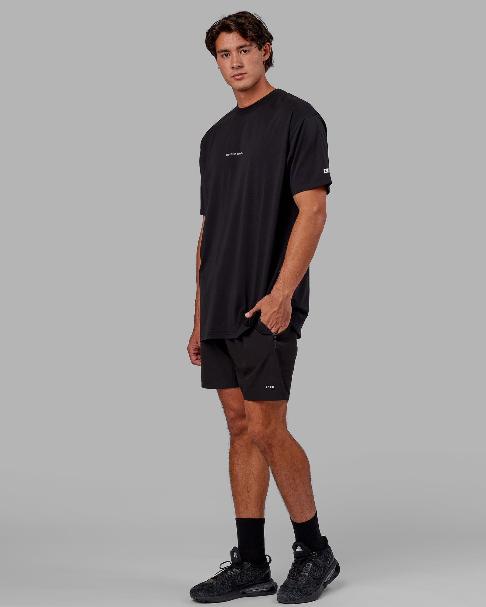 Model wearing Trust The Process FLXCotton Tee Longline Oversize - Black