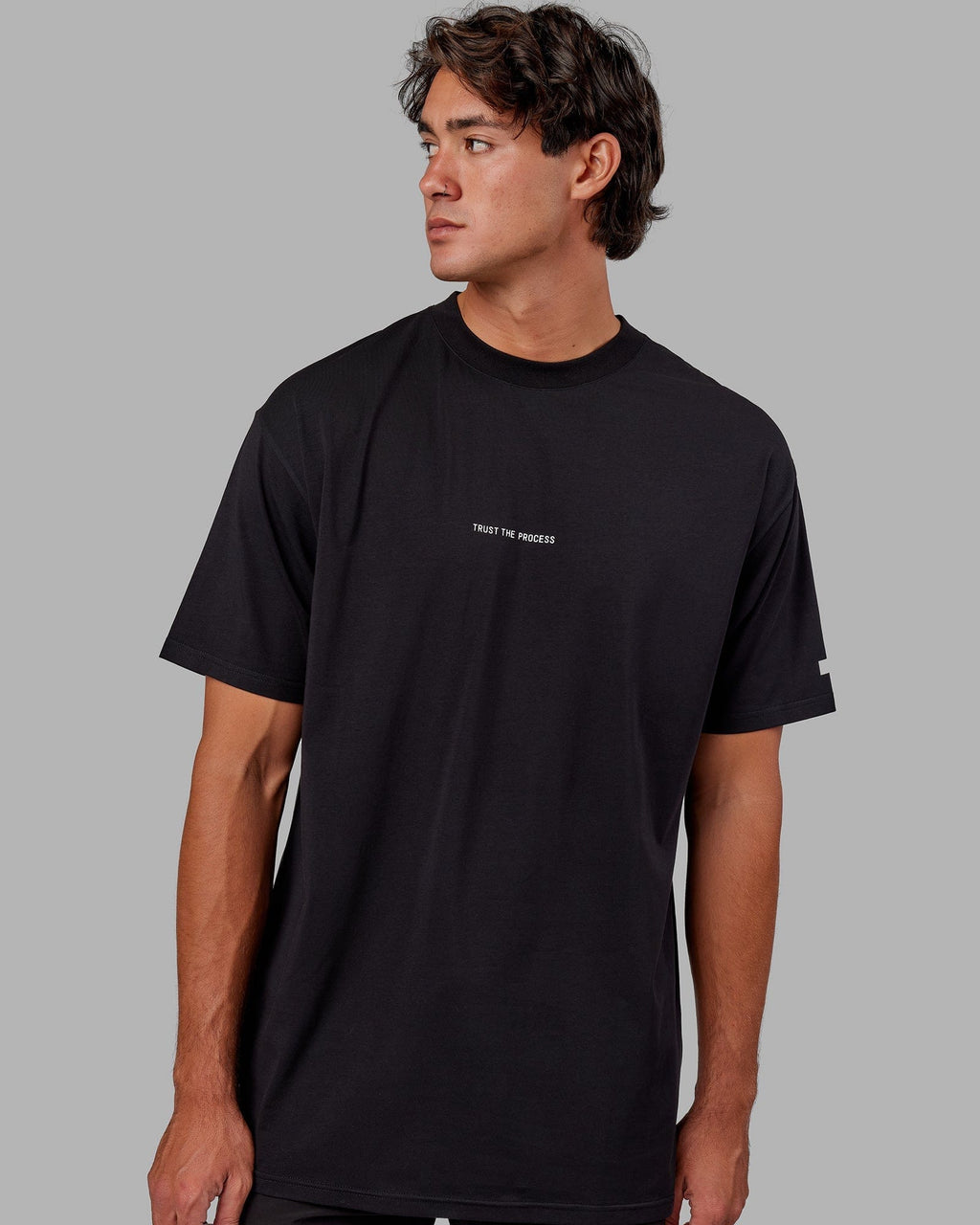 Model wearing Trust The Process FLXCotton Tee Longline Oversize - Black