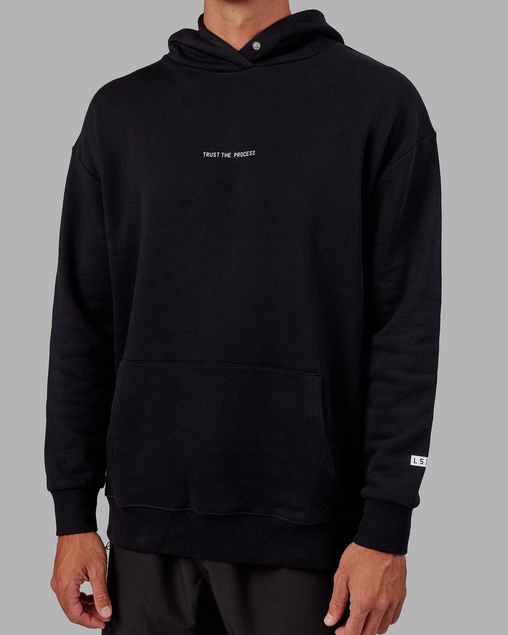 Model wearing Trust The Process Hoodie Oversize - Black