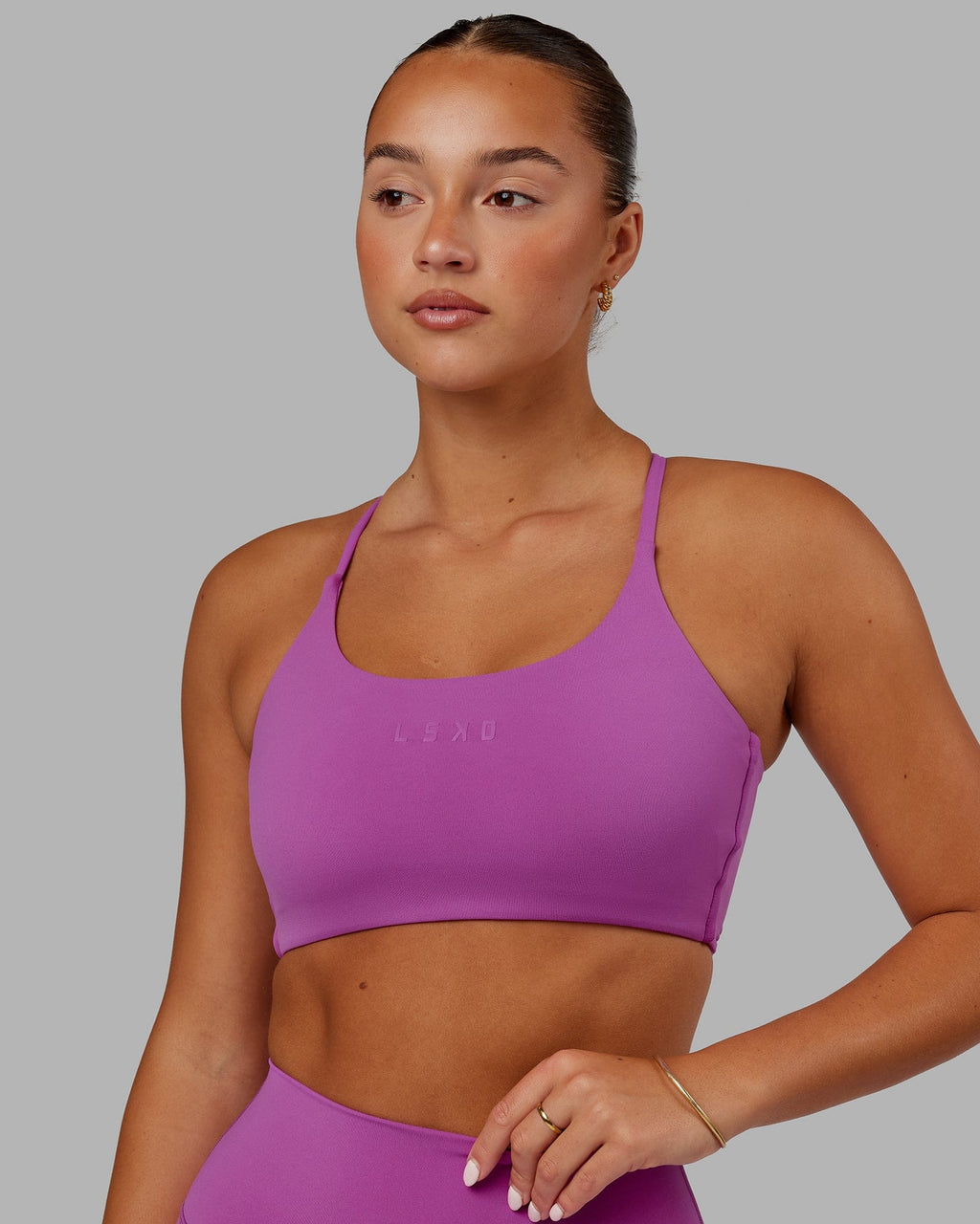 Model wearing Twist Sports Bra - Orchid
