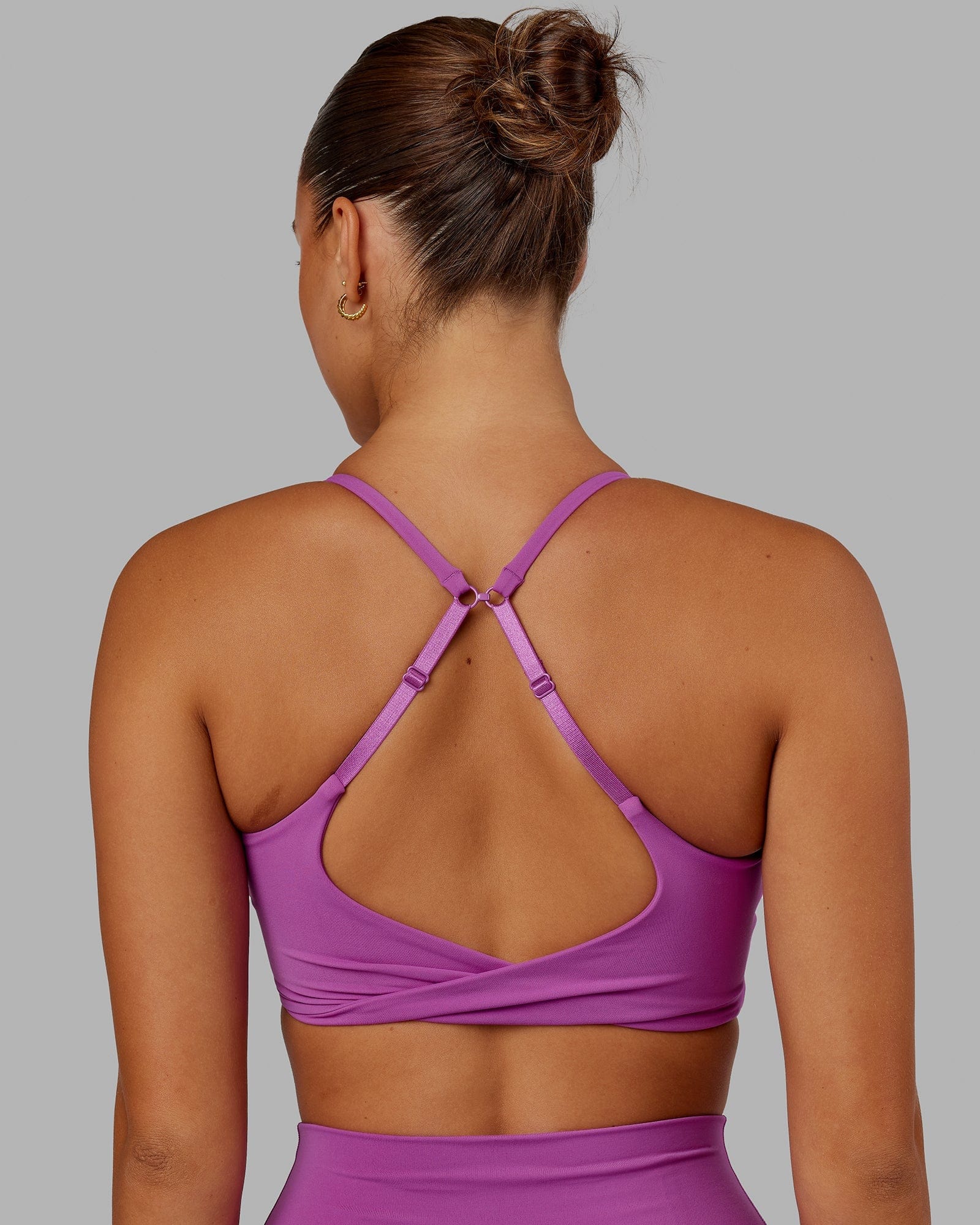 Model wearing Twist Sports Bra - Orchid