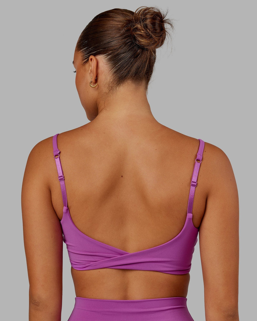 Model wearing Twist Sports Bra - Orchid