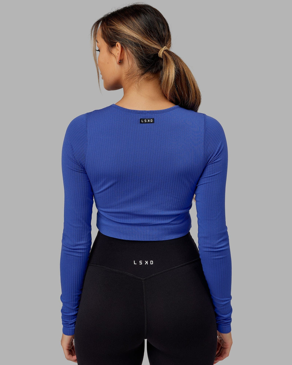 Model wearing Ultra Soft Seamless LS Top - Power Cobalt