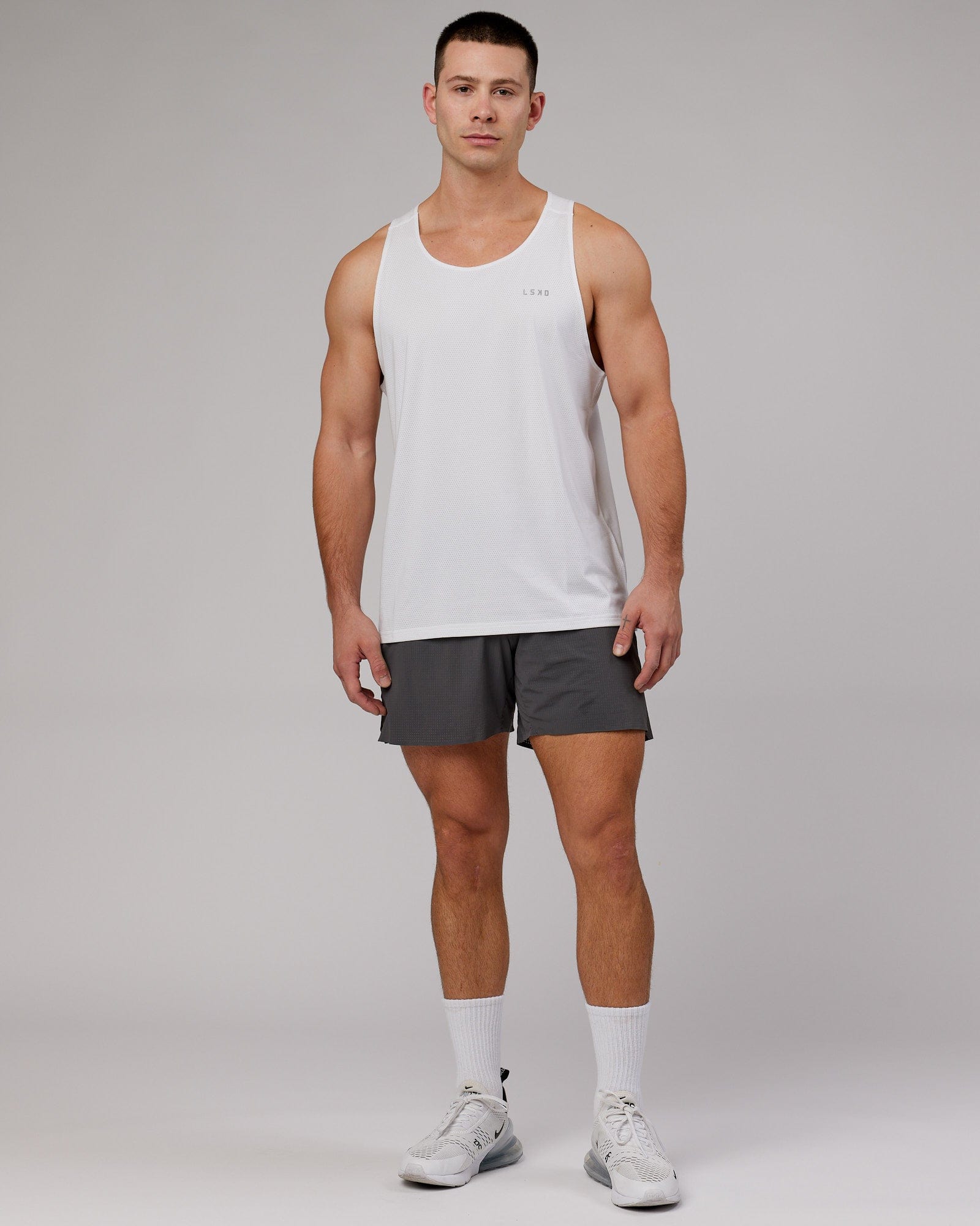 Model wearing UltraAir 6" Lined Performance Short - Asphalt