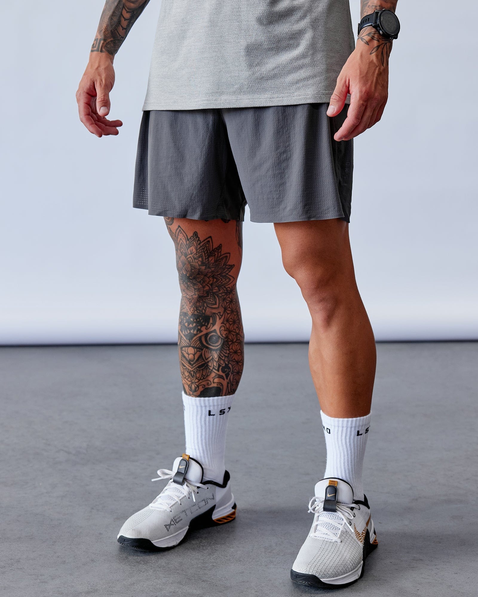 Model wearing UltraAir 6" Lined Performance Short - Asphalt