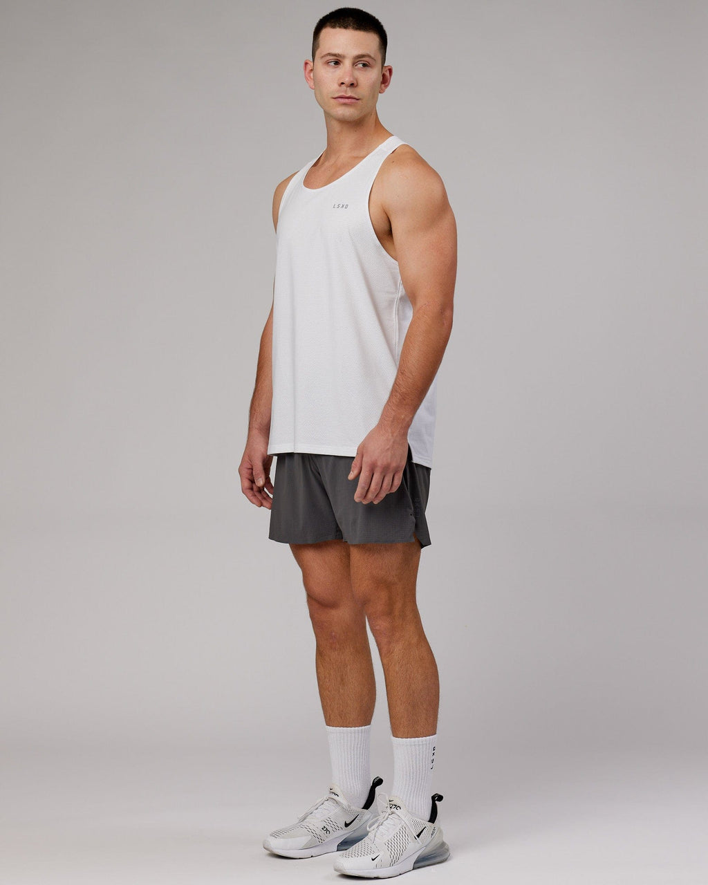 Model wearing UltraAir 6" Lined Performance Short - Asphalt